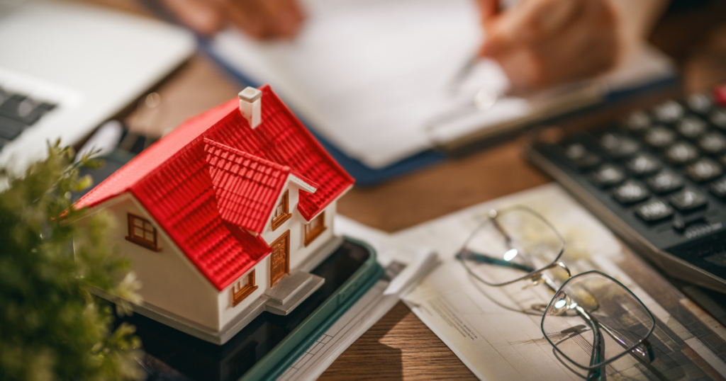 estate plan small house and glasses