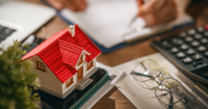 estate plan small house and glasses